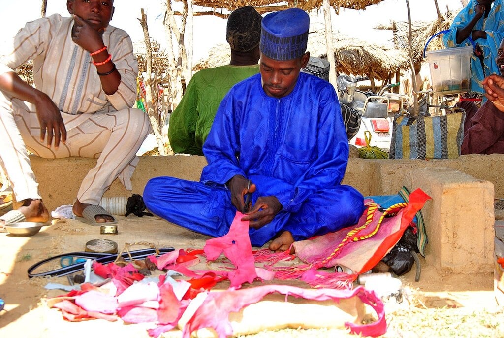 Local man using leather to make bags