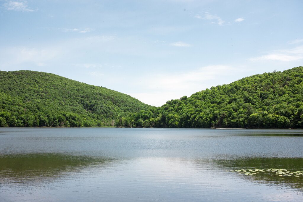 Two hills by a lake