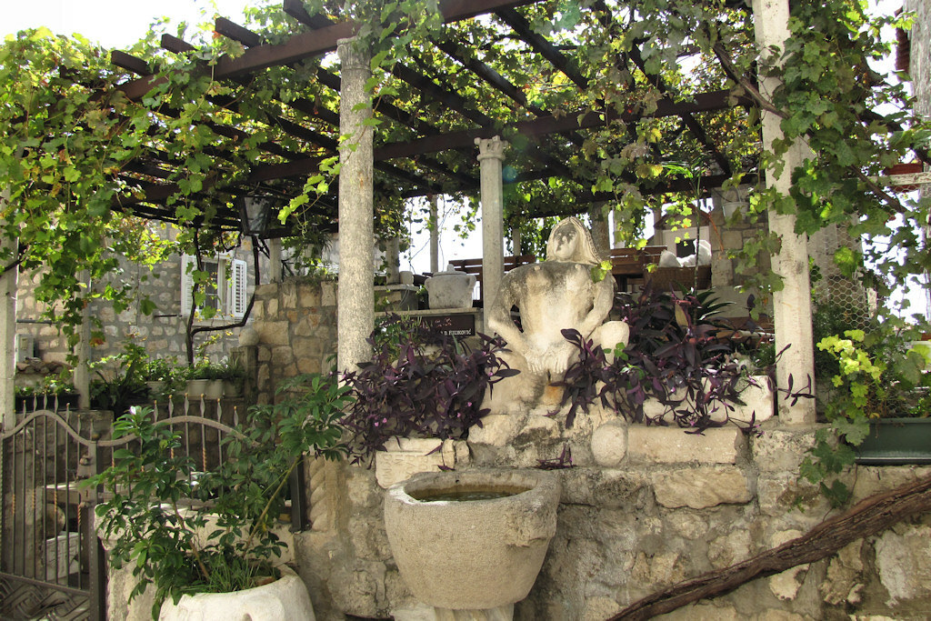 Konoba Lady Pi Pi restaurant with remarkable fountain, the Old City, Dubrovnik, Croatia