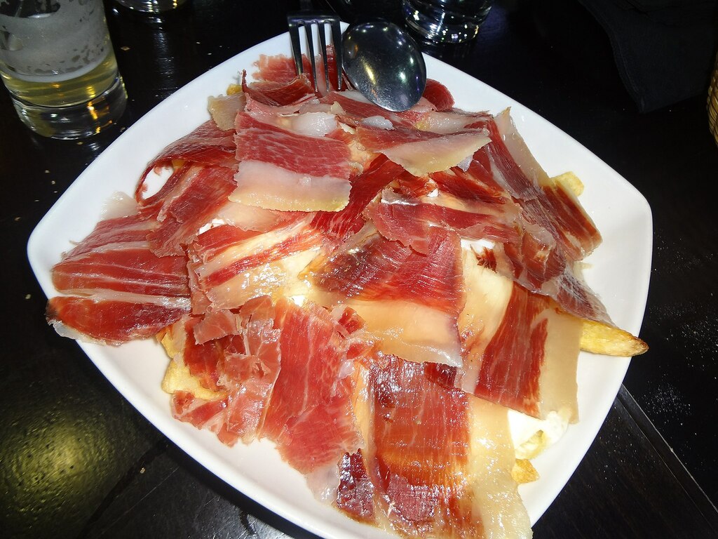 ( Madrid, Spain, tapas, Jamón serrano is a type of dry-cured Spanish jamón )