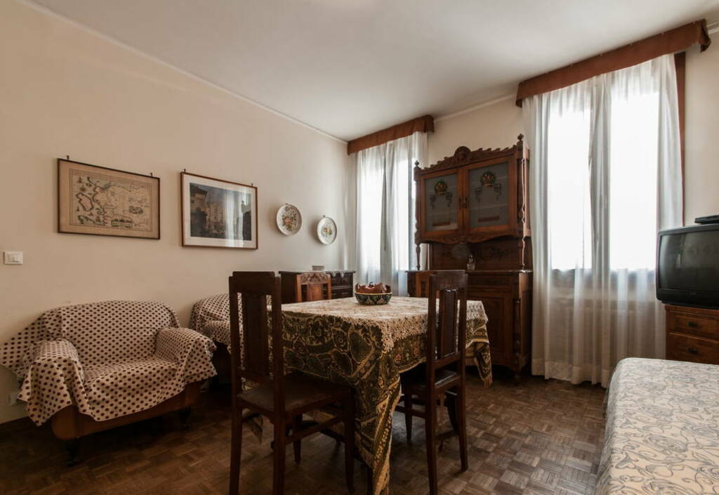 Living and dining area of Typical Venetian Apartment