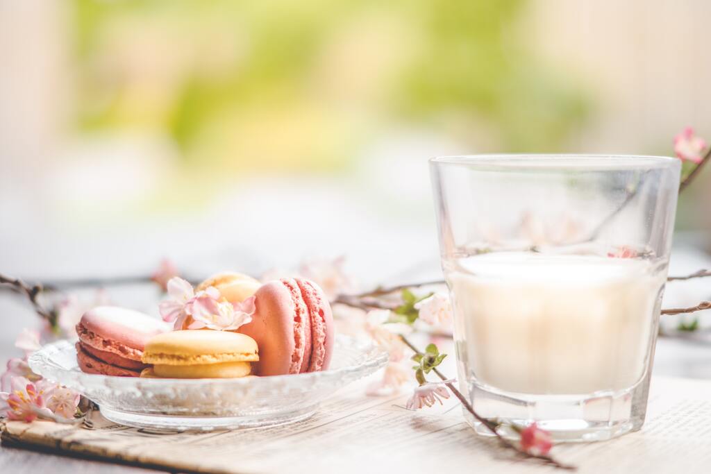 Macarons and milk for a perfect dessert combo.