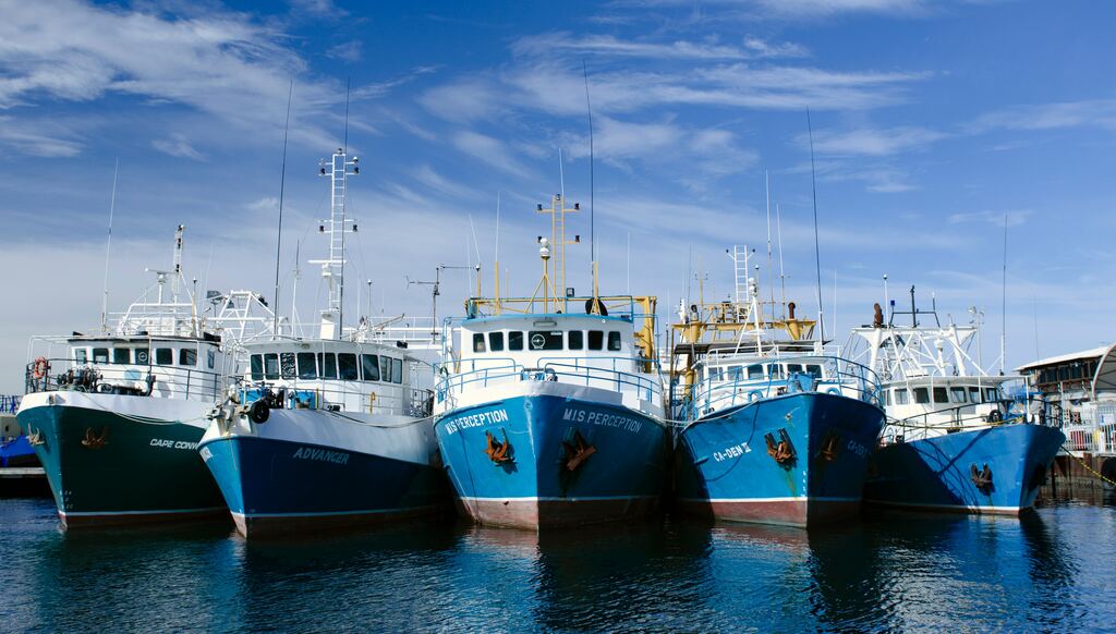 Photo of Fishing Boat Harbour by Eddie Bugajewski used under the Unsplash License