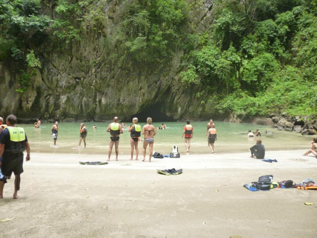 things to do in thailand | swim through koh mook’s morakot cave and be dazzled at what lies the other side