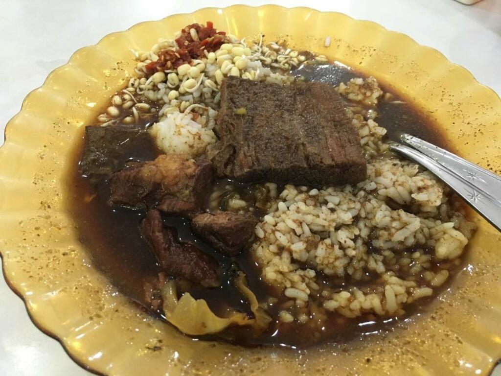 food to try in surabaya | rawon, the dark beef soup
