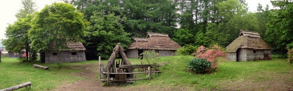 Nibutani Ainu Culture Museum in June 2009 showing thatched houses and storage huts