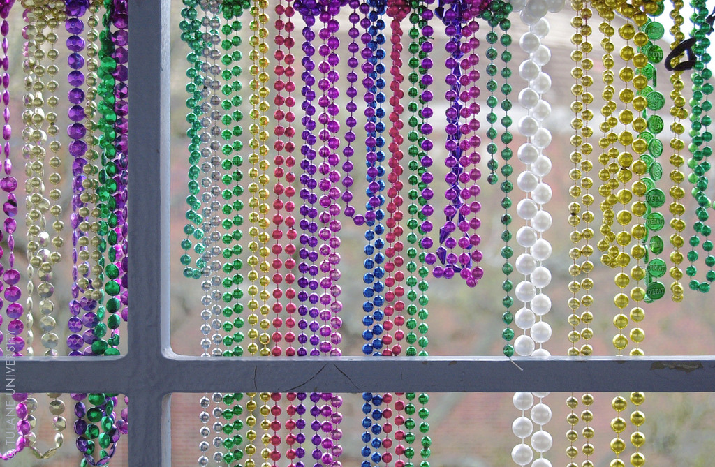 Mardi Gras Beads on Balcony (3639467444)