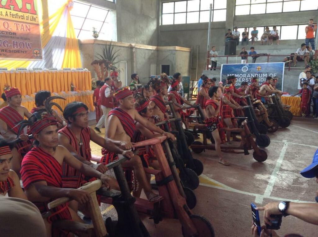 The wooden scooters and their riders.