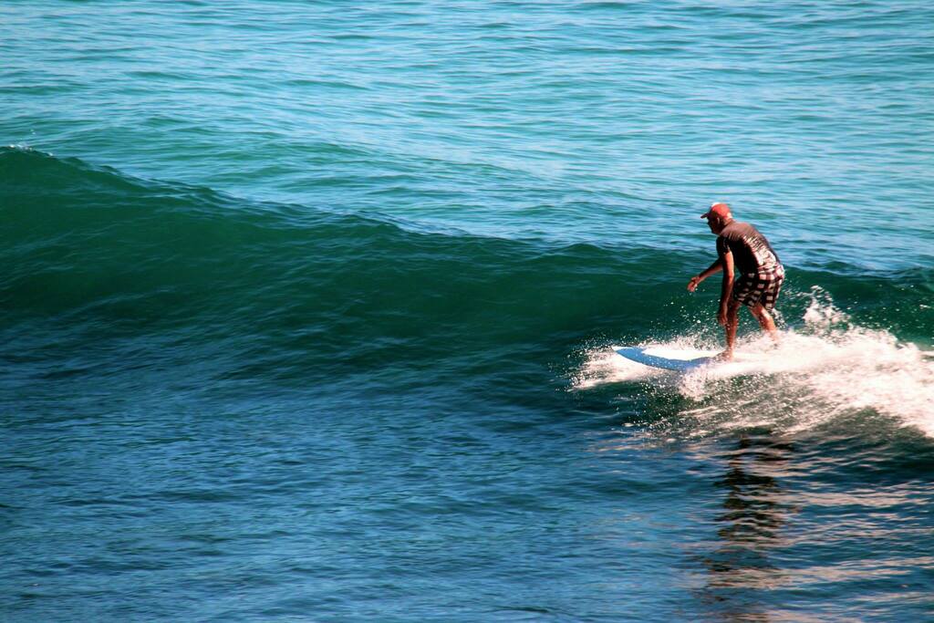 Surfing in hat