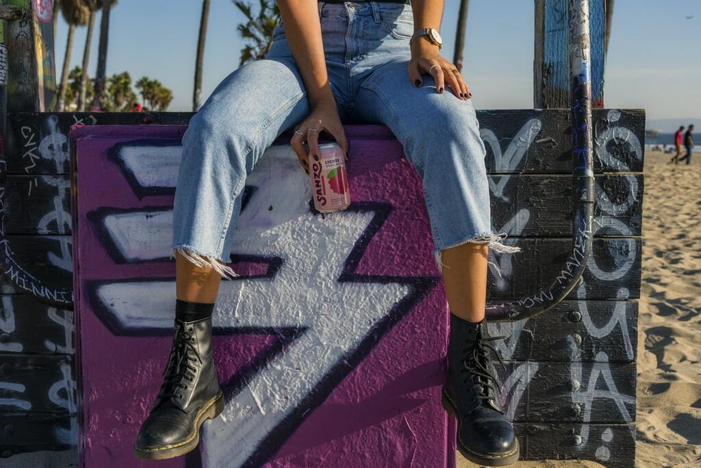 woman with soda can