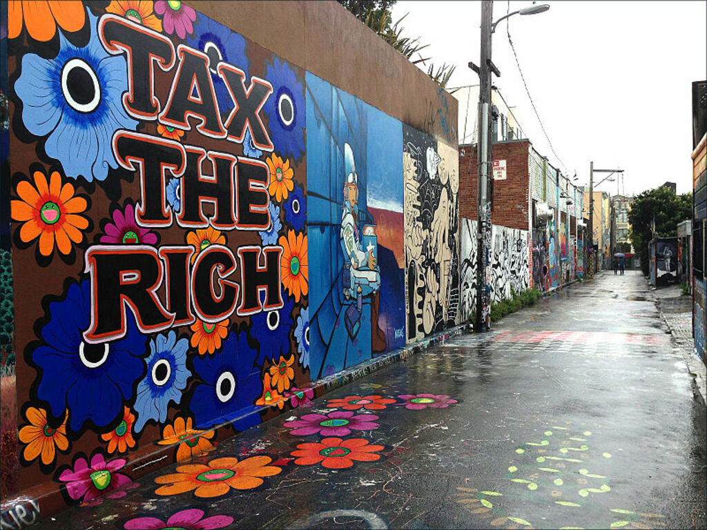 "Tax The Rich" mural by Megan Wilson on Clarion Alley San Francisco