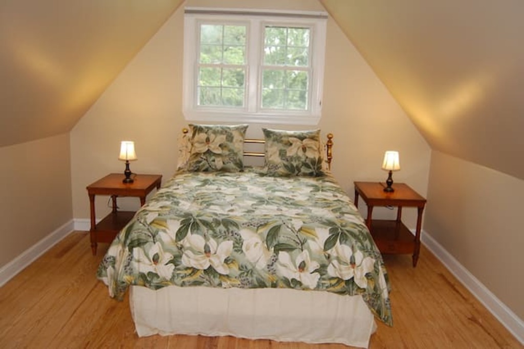 guest room in the attic of an 18th-century victorian mansion