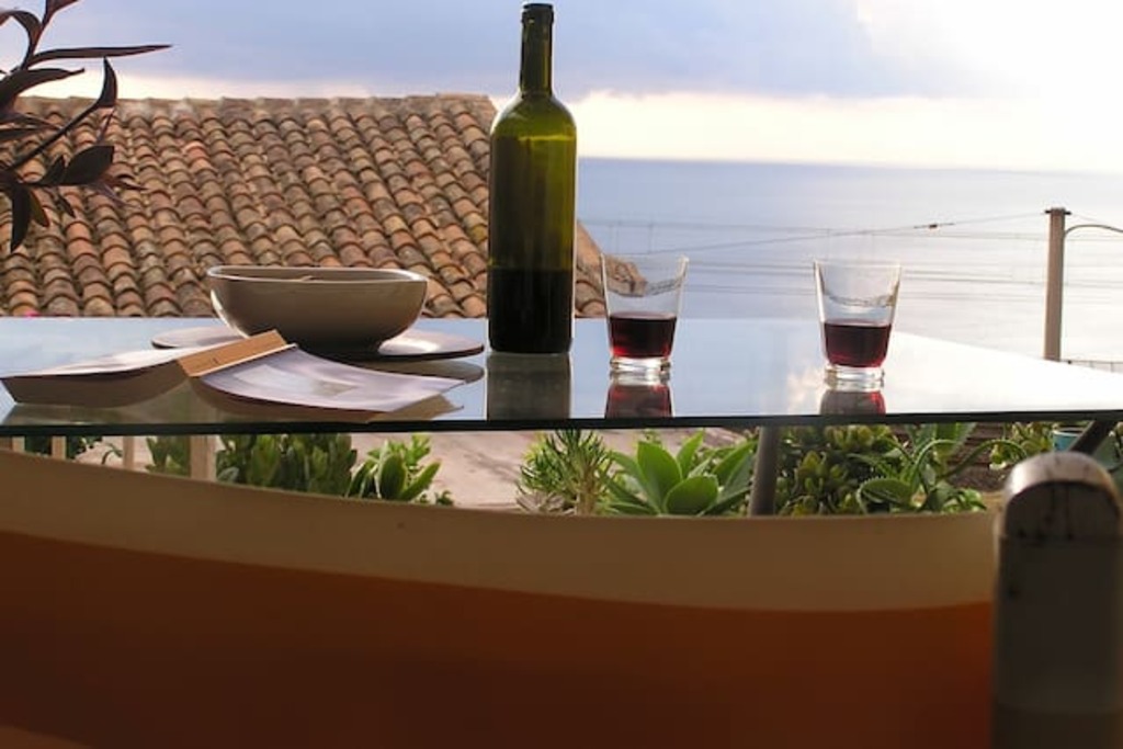 airbnb acireale | h-century house offering sea views