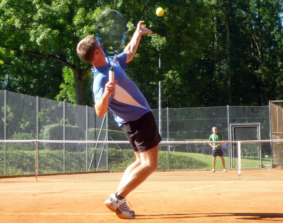 Men playing tennis