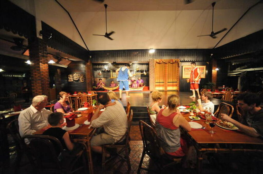 enjoy a traditional thai dinner and dance