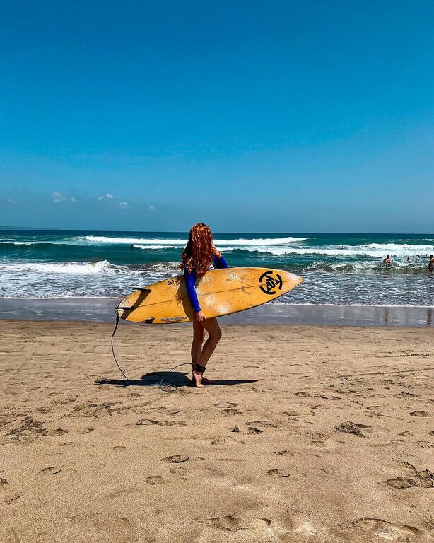 Surfing in Canggu Beach