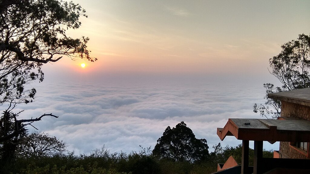 Early sunrise above clouds Nandi hills Bangalore