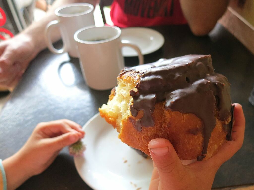 Chocolate doughnut and coffee at Honey's