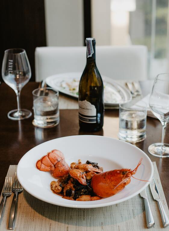 Lobster dish with wine