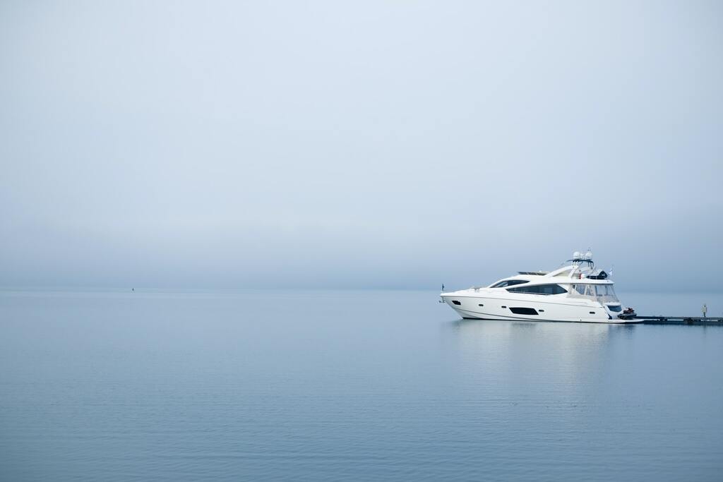 white motor boat