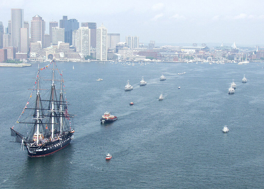 US Navy 050716-N-0335C-003 USS Constitution, the world's oldest commissioned warship afloat, is escorted to Boston Harbor's Castle Island by six yard patrol craft
