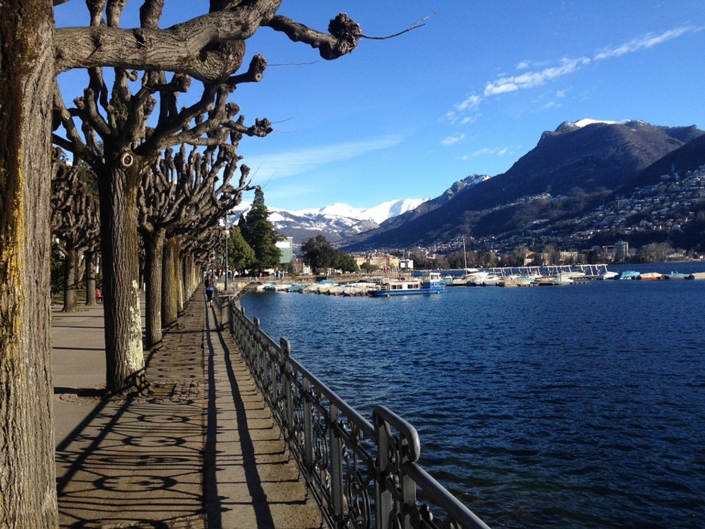 ride a water taxi along lake lugano