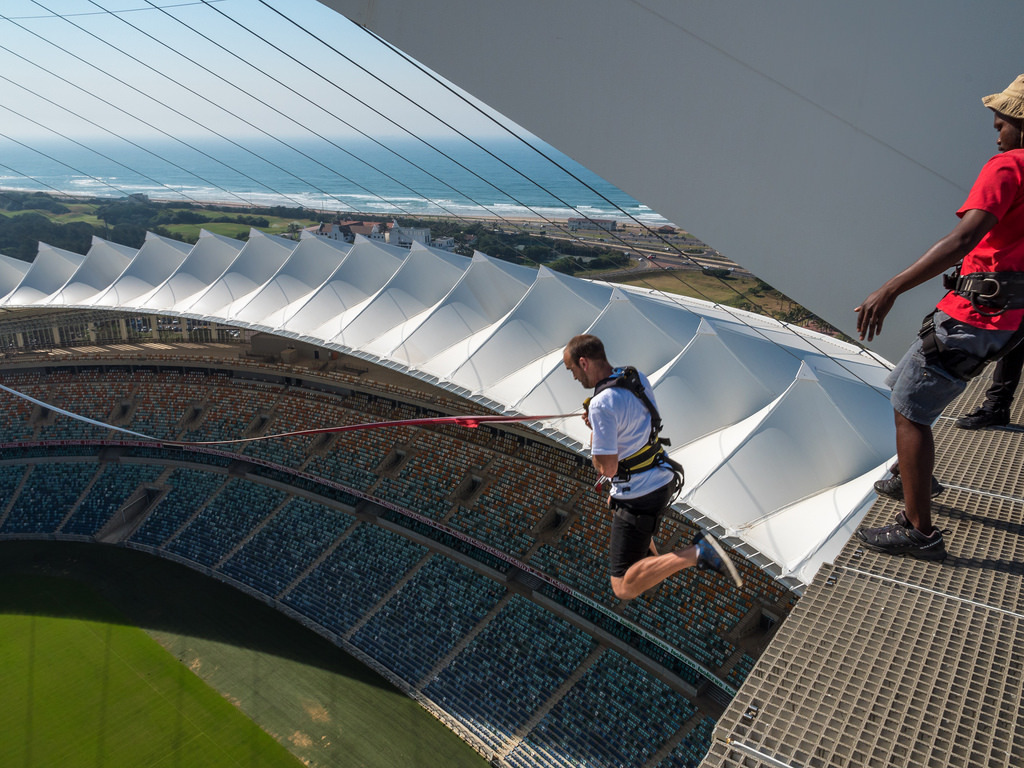Bungee jumping into Moses Mabhida Stadium, Durban, KwaZulu-Natal, South Africa