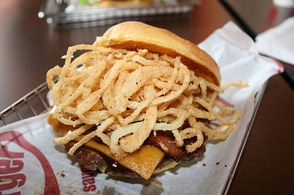 Smashburger BBQ bacon cheddar burger with deep-fried onions