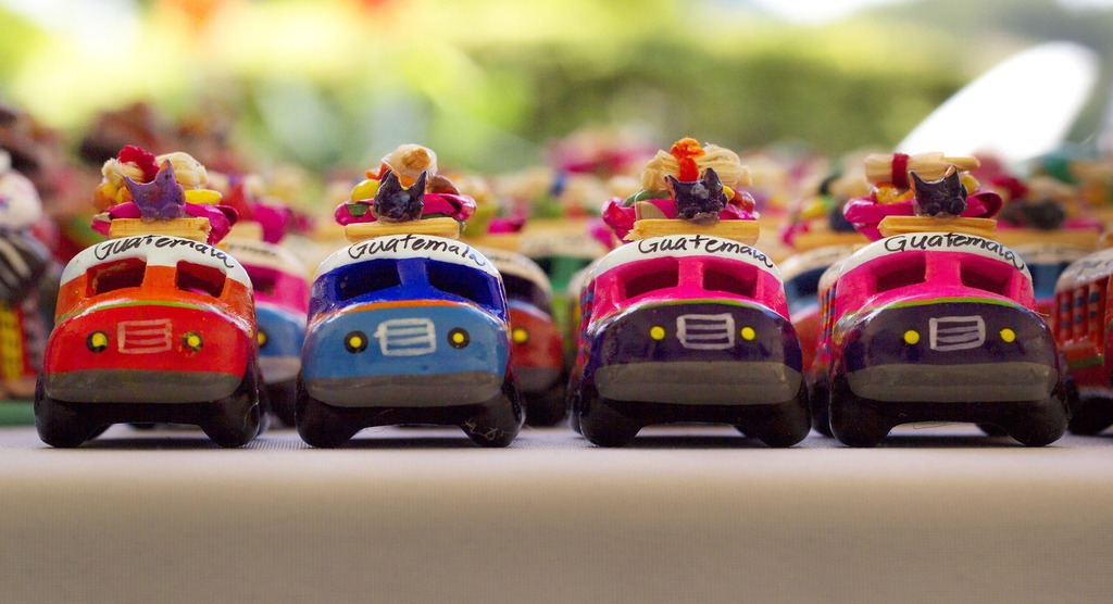 Colorfully crafted Guatemalan bus toys
