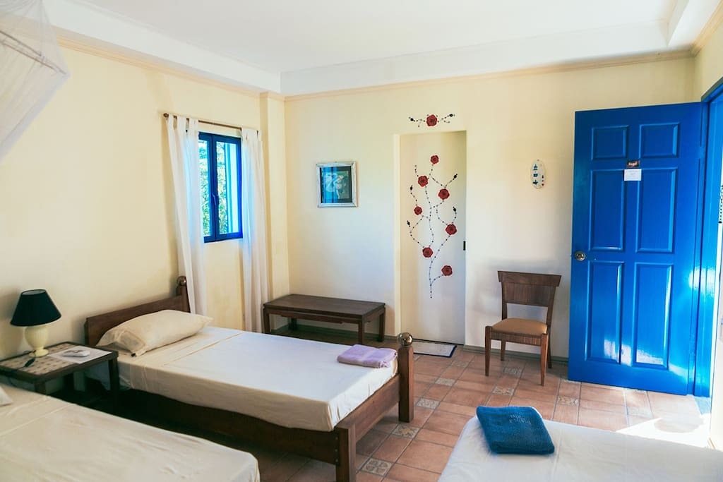 One of the nine bedrooms in the house.
