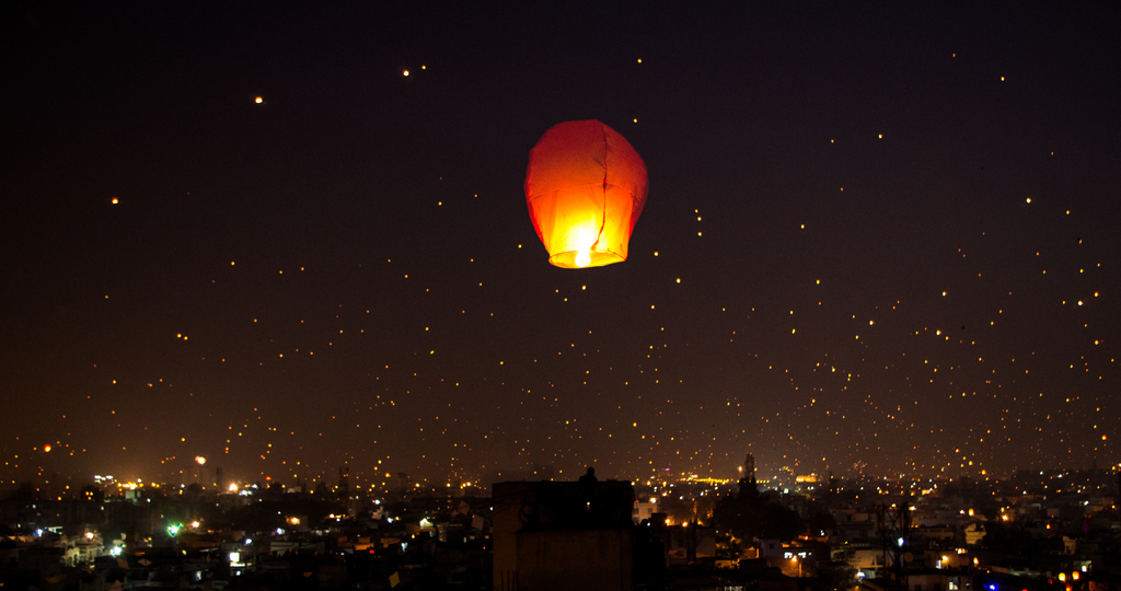 A night lit up on Makar Sankranti Uttarayana Festival with Kites and Lights India